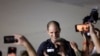 Evan Gershkovich, who was released from detention in Russia, reacts after disembarking from a plane at Joint Base Andrews in Maryland, U.S., August 1, 2024. REUTERS/Kevin Mohatt TPX IMAGES OF THE DAY 