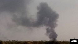 Smoke billows over Khartoum's Bahri district on June 21, 2023, as Sudan's warring generals resumed fighting just minutes after the latest U.S.- and Saudi-brokered cease-fire expired.