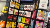FILE - Gift cards are displayed at a Target store, in New York, Dec. 21, 2023. Chinese organized crime rings have turned to gift card fraud schemes that have stolen hundreds of millions of dollars from American consumers.