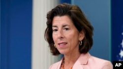 FILE - Commerce Secretary Gina Raimondo in Washington, Sept. 6, 2022. On Tuesday, the administration invited companies to compete for funds to build and expand domestic manufacturing semiconductor facilities. “This is fundamentally a national security initiative,” Raimondo said.