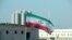 FILE - Bendera Iran di PLTN Bushehr Iran, 10 November 2019. (ATTA KENARE / AFP)