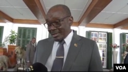 Kembo Mohadi talks to reporters at the State House in Harare, Sept. 8, 2023, after being sworn in as one of the two Zimbabwe’s vice presidents. (Columbus Mavhunga/VOA)