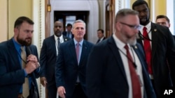 Speaker of the House Kevin McCarthy walks from the chamber to his office at the Capitol in Washington, Sept. 21, 2023.