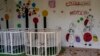 (FILE) Empty cribs at a playhouse in Kherson, Ukraine