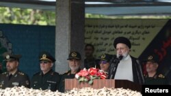 Iranian President Ebrahim Raisi delivers a speech during the National Army Day parade ceremony in Tehran, April 17, 2024. (Majid Asgaripour/WANA via Reuters) 