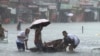 Streets flood from monsoon rains worsened by offshore Typhoon Gaemi in Manila, Philippines, July 24, 2024. The storm has already left several dead in the Philippines and is expected to drench China after passing over Taiwan.