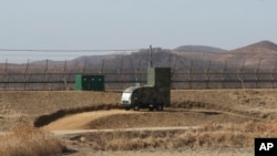 FILE - A South Korean military vehicle with loudspeakers is seen in front of the fence in Paju, near border with N. Korea, Feb. 15, 2018. Seoul announced June 9, 2024 it would resume anti-North Korean propaganda loudspeaker broadcasts to the North.