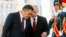 Kyrgyzstan's President Sadyr Japarov, left, and Russian President Vladimir Putin attend a welcome ceremony prior to their talks in Bishkek, Kyrgyzstan, Oct. 12, 2023. 
