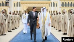 President of the UAE Sheikh Mohamed bin Zayed al-Nahyan bids farewell to Syrian President Bashar al-Assad at the Presidential Airport in Abu Dhabi, UAE, March 19, 2023. (Abdulla al-Neyadi/UAE Presidential Court/Handout via Reuters) 