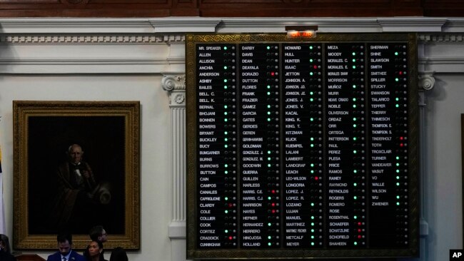 The voting board is lit with a majority of green lights as the house votes to impeach state Attorney General Ken Paxton in the House Chamber at the Texas Capitol in Austin, Texas, May 27, 2023.