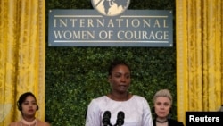International Women of Courage Awardee Fatou Baldeh of Gambia speaks during the annual International Women of Courage Award Ceremony ahead of International Women's Day at the White House in Washington, March 4, 2024. 