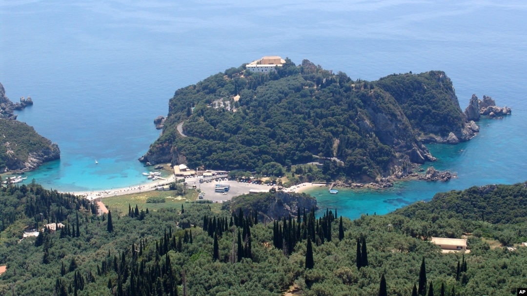 FILE - A portion of the west coast of Corfu is seen on in the Ionian Sea, May 29, 2005. The body of the man was found July 16, 2014, on a rocky and fairly remote beach on the nearby island of Mathraki.