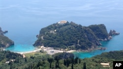 Sebagian wilayah dari Pulau Corfu terlihat dalam foto yang diambil pada 29 Mei 2005. (Foto: AP/Oliver Koenig)