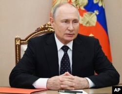 Russian President Vladimir Putin chairs a meeting with members of the Security Council via a video conference at the Kremlin in Moscow, Russia, on Aug. 25, 2023. Putin's spokesperson, Dmitry Peskov, on Aug. 24, 2023, rejected allegations that the Kremlin was behind the crash that killed Yevgeny Prigozhin.