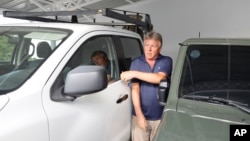 Canadian Richard Phillips walks in his home in Port-au-Prince, Haiti, March 8, 2024. Dozens of foreigners, including many Americans and Canadians, are stranded in Haiti, desperately trying to leave the violence-torn country.