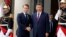France's President Emmanuel Macron, left, greets Chinese President Xi Jinping at the Elysee Palace in Paris, May 6, 2024.