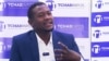 A presenter is seen in a screenshot from video on Tchadinfos' YouTube channel.