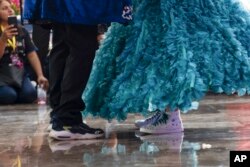 Miztli Valencia, 15, dances with a partner at the annual “Mis XV” or “My Fifteenth” birthday celebration for patients being treated for a serious disease or having overcome cancer, at the Federico Gomez Children’s Hospital in Mexico City, Aug. 9, 2024.