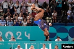 Simone Biles of the United States competes on the floor exercise during the final of the women’s artistic gymnastics all-around competition in Bercy Arena at the 2024 Paris Olympics in Paris, Aug. 1, 2024. (Jack Gruber/USA TODAY Sports)