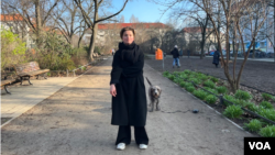 Katerina Abramova heads communications at the exiled outlet Meduza. She spoke with VOA, accompanied by her dog, on a cold February morning at a Berlin park. (Liam Scott/VOA)