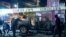 Police inspect a truck that exploded outside an office used by the government's National Service for Attention for People Deprived of Liberty (SNAI), which runs the jail system, in Quito, Ecuador, Aug. 31, 2023. 