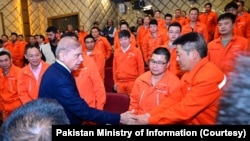 Pakistani Prime Minister Shahbaz Sharif meets with Chinese workers at Dasu hydropower plant, April 1, 2024. Five workers of the plant were killed in a suicide attack on March 26.