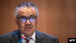 FILE- World Health Organization (WHO) Director-General Tedros Adhanom Ghebreyesus delivers a speech at the 77th World Health Assembly, in Geneva, May 27, 2024.