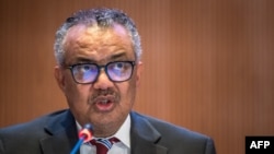 FILE- World Health Organization (WHO) Director-General Tedros Adhanom Ghebreyesus delivers his speech on the opening day of the 77th World Health Assembly, in Geneva, May 27, 2024.