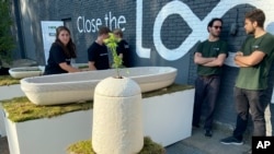 Dutch startup Loop Biotech displays cocoon-like coffins and urns, grown from local mushrooms and up-cycled hemp fibres, designed to dissolve into the environment amid growing demand for more sustainable burial practices, in Delft, May 22, 2023.