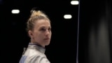 FILE - Olga Kharlan, of Ukraine, stands during the women's team sabre event against Uzbekistan at the Fencing World Championships in Milan, Italy, July 29, 2023. For Ukrainian competitors in Paris for the Olympics, joy goes hand in hand with sorrow. 