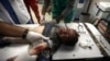A Palestinian child wounded in the Israeli bombardment of the Gaza Strip receives treatment at the Nasser hospital in Khan Younis, southern Gaza Strip, Dec. 29, 2023. 
