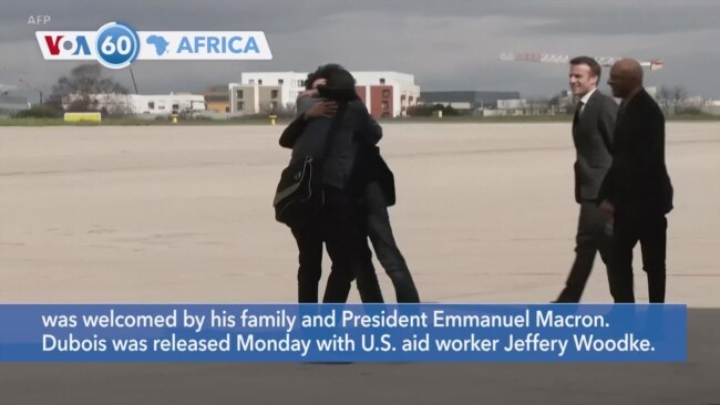 VOA60 Africa - Freed French journalist Dubois returns home 
