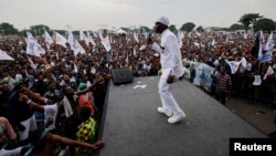 Congolese political veteran and presidential candidate Martin Fayulu addresses supporters during a campaign rally in Kinshasa in the Democratic Republic of Congo, Dec. 16, 2023.