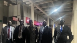 Members of the People's Coalition for Civil Action attending peace talks in Nairobi, Kenya pose for a photo at Jomo Kenyata International Airport, Tuesday, June 4, 2024. (Courtesy photo)