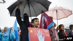 Ethnic Uyghur demonstrators take part in a protest against China near the Chinese Consulate in Istanbul, on Oct. 1, 2023, China's National Day.