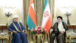 A handout picture provided by the Iranian presidency shows Iran's President Ebrahim Raisi (R) meeting with Oman's Sultan Haitham bin Tariq al-Said in Tehran, May 28, 2023. (Photo by Iranian Presidency / AFP)