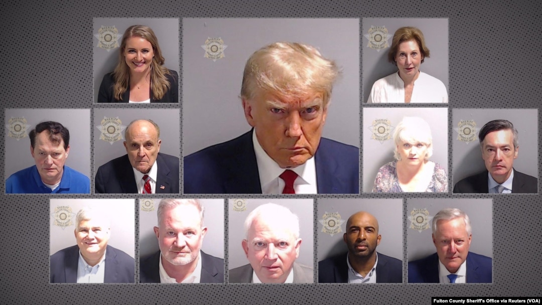 The booking photo of former President Donald Trump, center, with others indicted in Fulton County, Ga., including former White House Chief of Staff Mark Meadows, bottom right, and former New York Mayor Rudy Giuliani, left of Trump. 