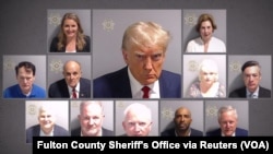 The booking photo of former President Donald Trump, center, with others indicted in Fulton County, Ga., including former White House Chief of Staff Mark Meadows, bottom right, and former New York Mayor Rudy Giuliani, left of Trump. 