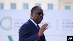 FILE - Senegal's President Macky Sall arrives at a meeting on June 23, 2023, in Paris. Pape Alé Niang, an investigative journalist and director of news website Dakar Matin in Senegal, says he believes Sall's government is "drifting towards becoming dictatorial."