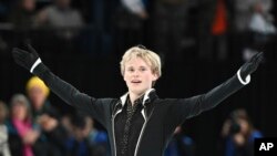 Ilia Malinin of the United States reacts following his free skate in the men's competition at the figure skating world championships in Montreal, March 23, 2024.