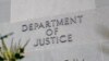 La señal identifica la entrada al edificio Robert F. Kennedy del Departamento de Justicia, en Washington, el 23 de enero de 2023.