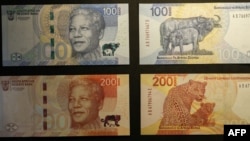 FILE — Newly upgraded South African Rand banknotes are displayed at the Nelson Mandela Foundation in Johannesburg, May 4, 2023. 