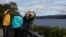 German tourists take pictures of Loch Ness as people take part in the largest Loch Ness Monster hunt in 50 years, in Scotland, Britain, Aug. 27, 2023. 