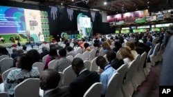 Delegates follow the closing session of the Africa Climate Summit at the Kenyatta International Convention Centre in Nairobi, Kenya, Sept. 6, 2023.