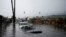 Cars are submerged on a flooded street during a rain storm in Santa Barbara, California, Dec. 21, 2023.
