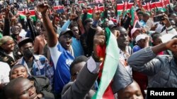 People react during a concert organized in memory of dozens of demonstrators killed during tax hike protests, in Nairobi, Kenya, July 7, 2024.