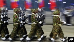 Myanmar military officers march during a parade to commemorate Myanmar's 79th Armed Forces Day, in Naypyitaw, Myanmar, March 27, 2024. 