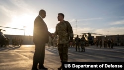 FILE - U.S. Defense Secretary Lloyd Austin III visits Erbil Air Base in Iraq on March 7, 2023.