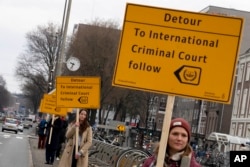 Demonstrators protest against Israel's President Isaac Herzog attending the opening of the new National Holocaust Museum in Amsterdam, The Netherlands, March 10, 2024.