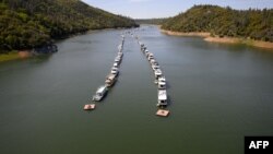 Boats are parked on a filled Lake Oroville in Oroville, California, on April 16, 2023.